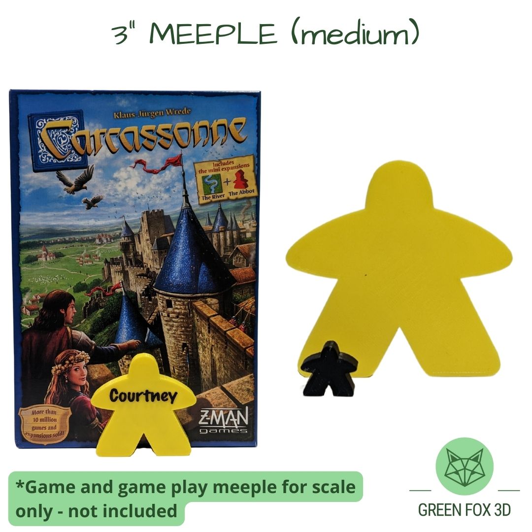 A comparison of a personalized, 3 inch meeple against game token and board game box.