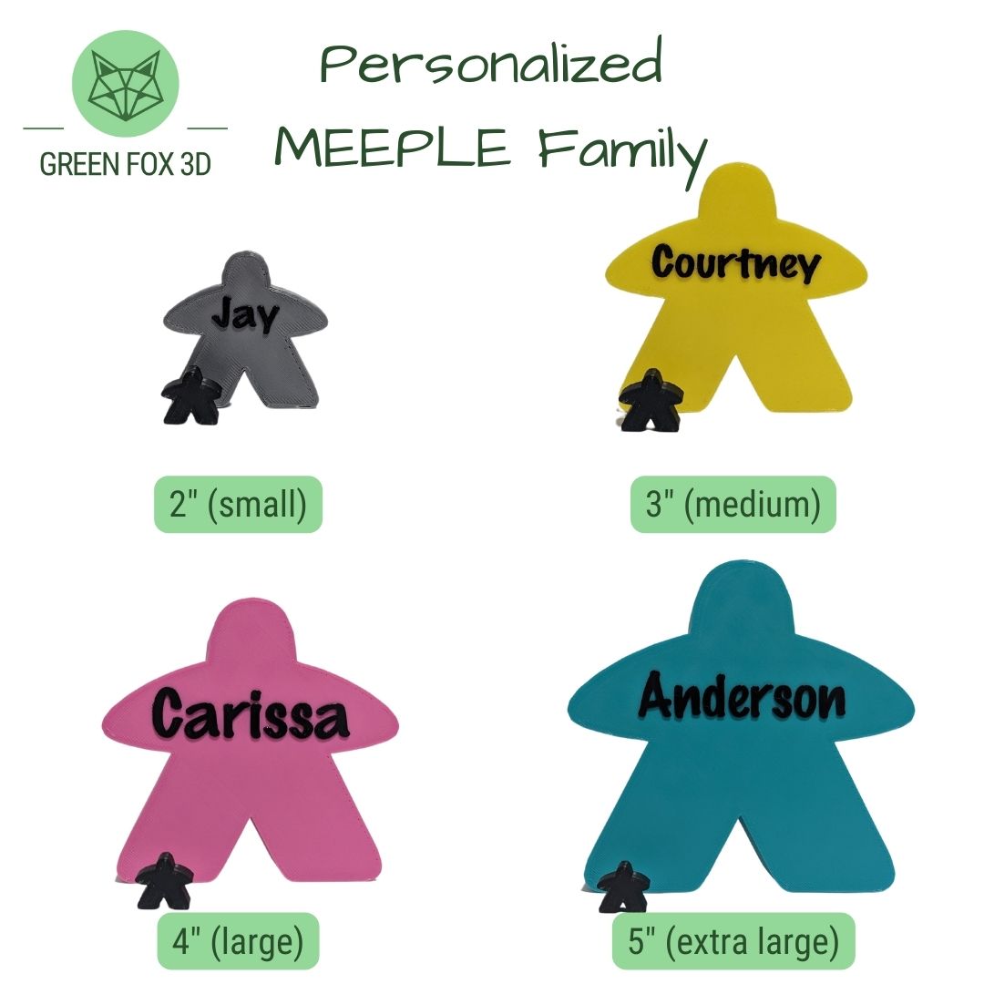 A comparison of various sized, personalized meeples against each other and a game token.