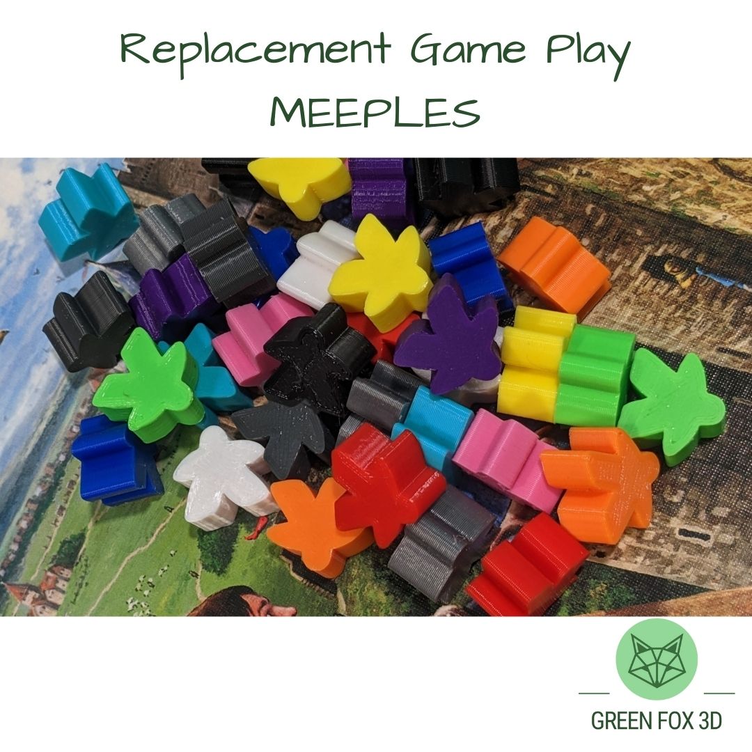 A collection of meeple game tokens in various colors.